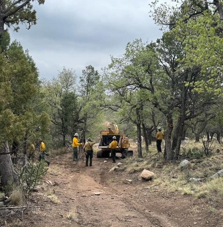 Chipping along containment lines on Seven Cabins Fire