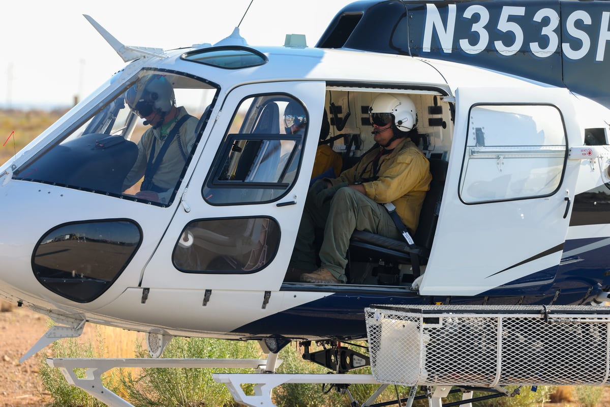 Helicopter Transporting Crews to Remote Areas of the Fire