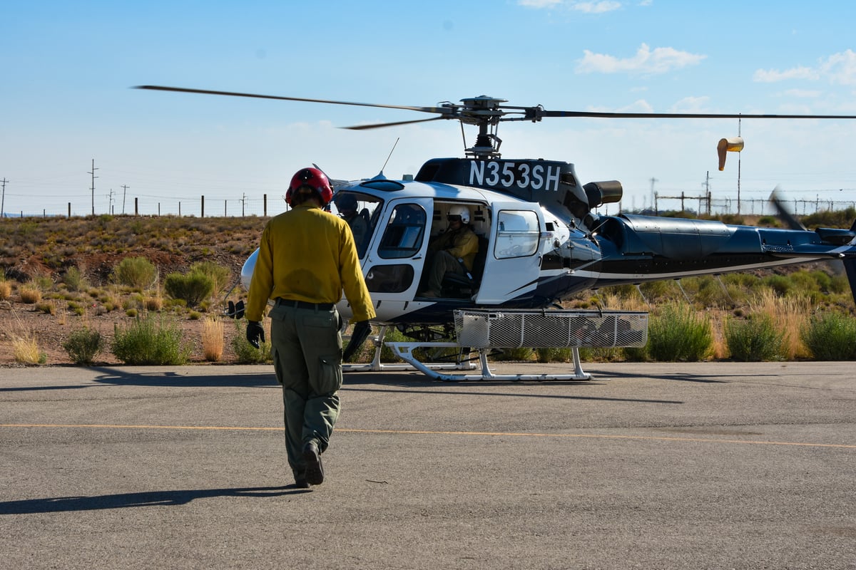 Helicopter Transports Crews to Remote Areas