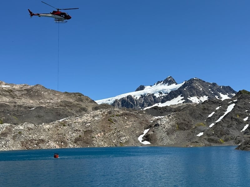 Helicopter Dip from Alpine Lake