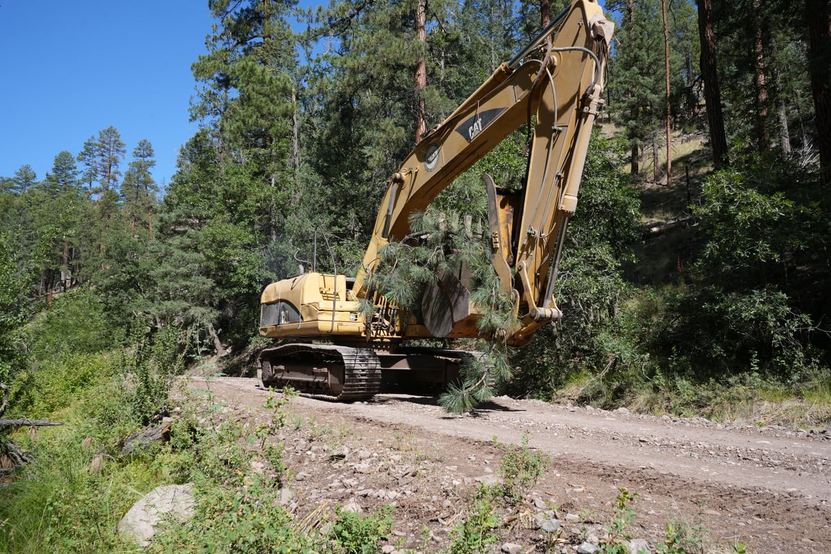 Excavator Clearing Debris on Sacaton Fire