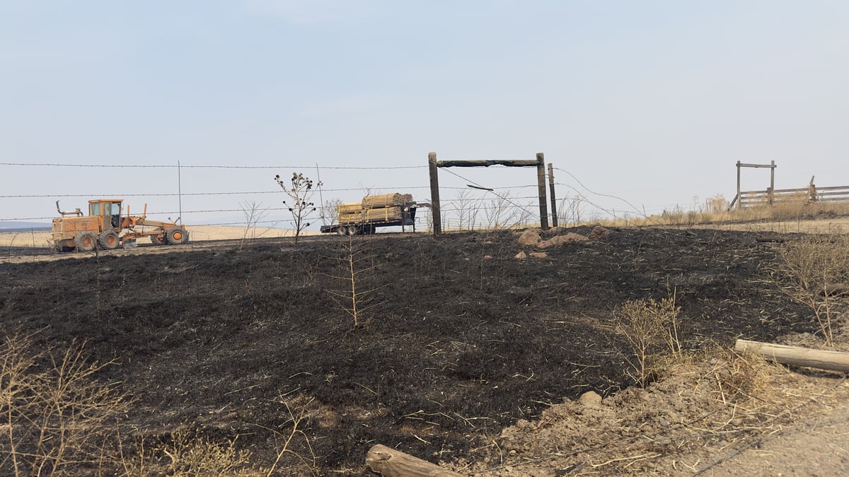 Grader working on the Porcupine Fire