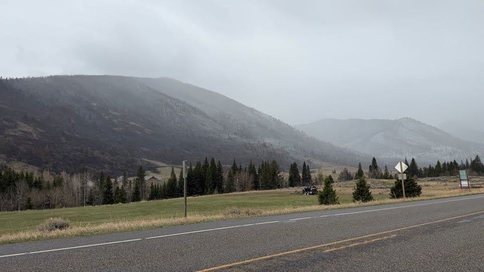 Scattered precipitation on the East Side Fire