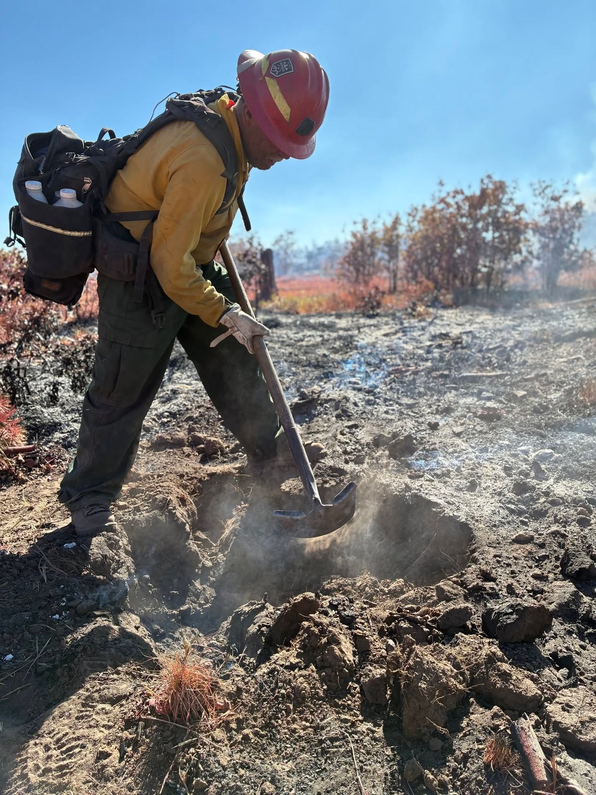 Digging line to help stop the Ferris Fire