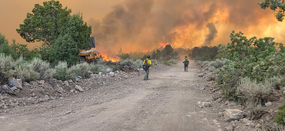 Firefighters walk dozer line on Grapevine Fire in June 2026