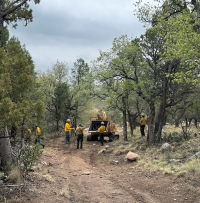 Chipping along containment lines on Seven Cabins Fire