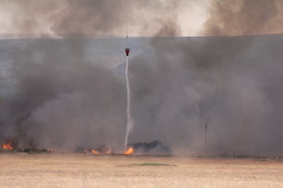 Helicopter Bucket Dropping Water