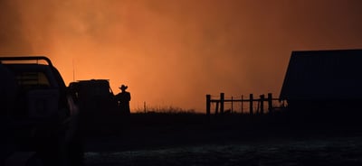 Local firefighters and ranchers have worked closely wi...