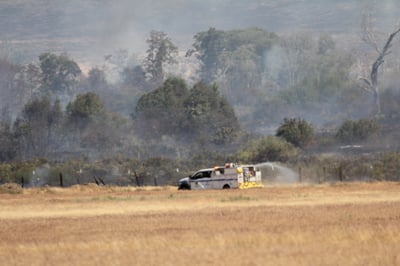 Engine Spraying Water on Fire