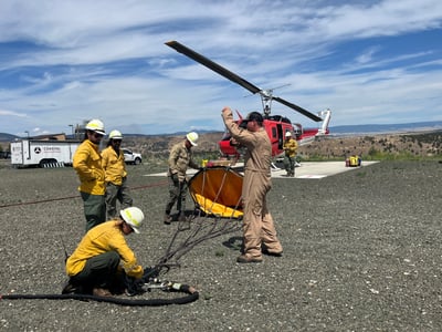 Helitack Inspecting Water Bucket