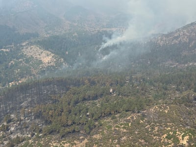 Fire burning within 2016 Junkins Fire