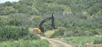 Heavy machinery working on the Gold Mountain Fire