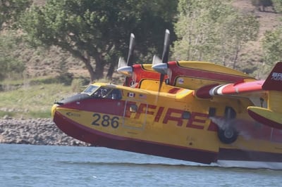 CL415 Scooping water